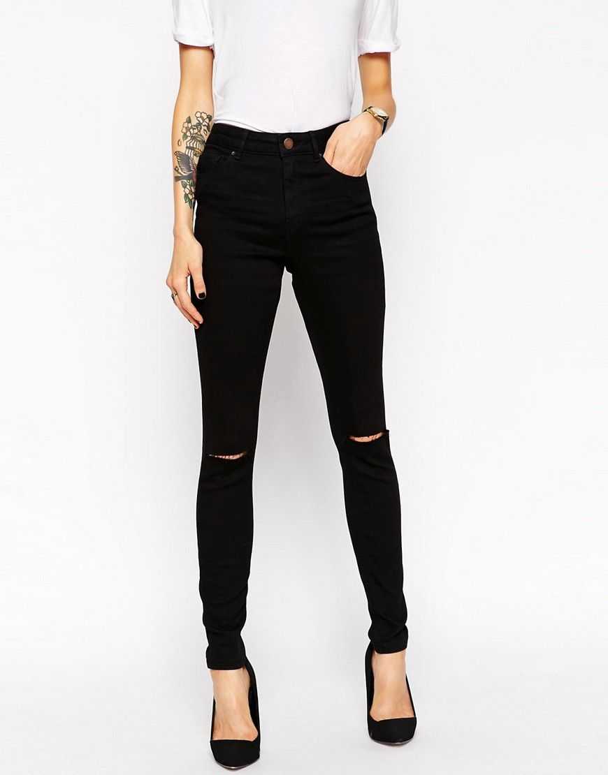 Черные джинсы с дырками на коленях, выбираем самые модные